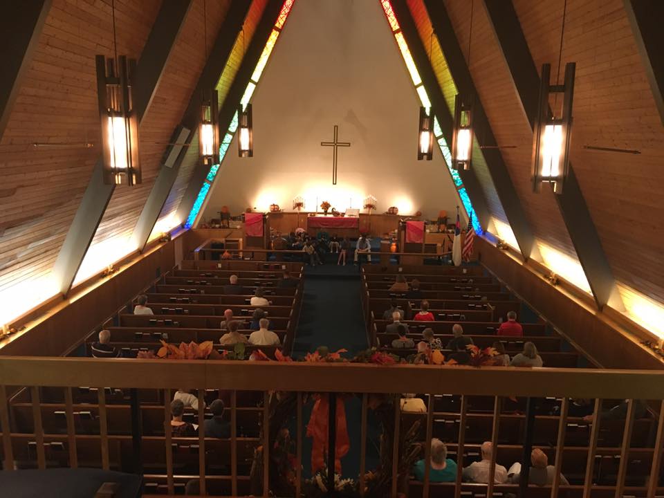 members sitting in the pews during worship